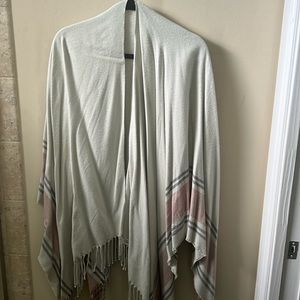 Poncho with tassels